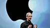 Apple-sjef Tim Cook sier han er fornøyd med utviklingen, selv om omsetningen faller for første gang på 15 år.