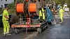 Tilskudd til bredbånd på steder der markedet ikke sørger for forbindelsen, var en stund blant postene som fikk kutt i budsjettforliket. Her illustrert ved legging av fiber i mikrogrøfter på Nesodden. Foto: Håvard Fossen