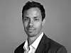 Jonas Erraia er prosjektansvarlig for studien og partner i Menon Economics. Han tror kunstig intelligens vil trekke i retning av den historiske trenden med redusering av arbeidstid. Foto: Menon Economics