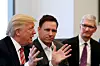 FILE PHOTO - U.S. President-elect Donald Trump speaks as PayPal co-founder and Facebook board member Peter Thiel (C) and Apple Inc CEO Tim Cook look on during a meeting with technology leaders at Trump Tower in New York U.S., December 14, 2016.