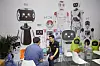 Veggplakat med tjenesteroboter på World Robot Conference (WRC) i Beijing fra august 2019. Foto: Reuters/Jason Lee