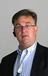 Espen Andersen tror vestlige konkurrenter med solid tilstedeværelse i India, som IBM og Accenture, har mest å tjene på Satyam-skandalen.