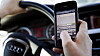 Hittil i år har mange færre enn i fjor fått bot for å bruke mobiltelefon mens de kjører bil.