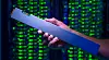 The ruler-shaped PCIe-based QLC Intel SSD D5-P4326 can hold up to 32 terabytes. As part a 1PB solution, it draws just one-tenth the power of a traditional spinning hard drive solution. (Credit: Walden Kirsch/Intel Corporation)