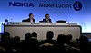 Fra pressekonferansen om Nokias oppkjøp av Alcatel-Lucent. På bildet vises toppsjefene i de to selskapene, Michel Combes og Rajeev Suri.