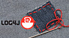 Nål, lappesaker og Log4j-logoen.