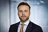 Daniel Holth Larsen i DNV leder nå en offensiv satsing for å frigjøre verdifulle hender i et presset helsevesen.