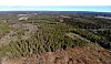 Gylderåsen preges i dag mest av skog, noe dyrket mark og snauhogst. Området er regulert for det som kan bli en av Norges største industriinvesteringer gjennom tidene i regi av Google. Foto: Våler KI