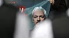 Et bilde av Julian Assange under en demonstrasjon gjennomført av Assanges støttespillere utenfor Westminster Magistrates' Court i London fredag.