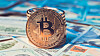 Golden Bitcoins (new virtual money ). Image toned in vintage dull colors.