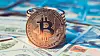 Golden Bitcoins (new virtual money ). Image toned in vintage dull colors.