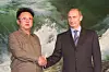 TAS01: PYONGYANG, July 20. - North Korean leader Kim Jong Il (left) and Russian President Vladimir Putin shake hands after they signed a joint declaration in Pyongyang on Wednesday. Under the declaration, the two sides agreed to develop and strengthen bilateral relations, and to expand economic cooperation. The declaration also reflects Russias and North Koreas positions on the most important international issues. (ITAR-TASS photo/ Sergei Velichkin, Vladimir Rodionov) ----- ÒÀÑ. Ðîññèÿ. Ìîñêâà. 20 èþëÿ. Ðàáî÷èé âèçèò ïðåçèäåíòà Ðîññèè Âëàäèìèðà Ïóòèíà â ÊÍÄÐ. Íà ñíèìêå: ïðåçèäåíò Ðîññèè Âëàäèìèð Ïóòèí /ñïðàâà/ è ðóêîâîäèòåëü ÊÍÄÐ Êèì ×åí Èð ïîñëå ïîäïèñàíèÿ Ñîâìåñòíîé ðîññèéñêî-êîðåéñêîé äåêëàðàöèè â Ïõåíüÿíå. Ôîòî Ñåðãåÿ Âåëè÷êèíà è Âëàäèìèðà Ðîäèîíîâà (ÈÒÀÐ-ÒÀÑÑ)