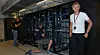 TRENGER FOLK: IT-direktør Lars Oftedal viser her fram universitetets beregningsklynge «Abel», som for tiden holder 96. plass på listen over verdens raskeste superdatamaskiner.