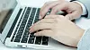 Hand, men use laptops.