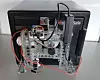 Her er SparkFun Safe Cracker-roboten montert på safen Nathan Seidle fikk til jul i fjor. De sentrale komponentene er et Arduino-enhet og en trinnmotor. Roboten er festet til safen med magneter. Bilde: SparkFun Electronics