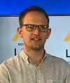 Teknologidirektør Alexander Salveson Nossum synes det er spennende at deres teknologi kan bidra til humanitært arbeid. Foto: Norkart