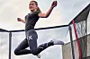 Fysisk-digital trampoline med en Playfinity-sensor montert på foten Foto: Playfinity