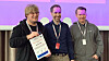 Bendik Hagen (til venstre) stakk av med seieren i årets Master of Cyber Security-konkurranse. Gjermund Marqvardsen (midten) og Oddvar Moe har laget spørsmålene til konkurransen.