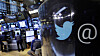 FILE - In this Oct. 13, 2015, file photo, the Twitter logo appears on a phone post on the floor of the New York Stock Exchange. Twitter shares fell Thursday, July 26, 2018, after President Donald Trump said in a tweet the company was limiting visibility of prominent Republicans and said he was going to look into the matter. (AP Photo/Richard Drew, File)