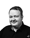 Senioranalytiker Hans-Petter Fjeld i Defendable setter pris på at det er lite å rydde opp etter DDoS-angrep. Foto: Defendable