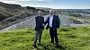 Ordfører Andreas Vollsund (t.v.) i Time kommune og Green Mountain-sjef Svein Atle Hagaseth foran Fagrafjell transformatorstasjon, i nærheten av området der de ønsker å bygge datasenter.