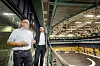 For øyeblikket er det en maks avstand på 130 meter mellom kamera og regikontroll. Derfor ligger kontrollromene for lyd og bilde, samt teknisk rom, vegg i vegg med TV-studioene. Andreas Munkelien og Pål Nedregotten i NRK står her vendt mot Studio 2 og med kontrollrommene rett bak seg. Foto: Arash A. Nejad