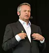 Toppsjef Endre Rangnes mener EDB sliter i motvind, selv om forventningene ble innfridd i andre kvartal.