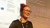 Utvikleren Marit Iren Tokle under en presentasjon om sikkerhet som hun holdt på Nordic Fraud Conference.