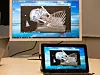 Her får vi en demonstrasjon av hvordan man kan jobbe med en 3D-modell basert på MR-bilder. Grafikkprosesseringen foregår i en virtuell maskin, mens kun skjermbildet streames over til brukere som kan sitte hvor som helst i verden. . Foto: Kurt Lekanger, digi.no