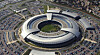 Mannen bak smultringen: GCHQs hovedkvarter er kalt «The Doughnut» og ligger i Cheltenham. Sir David Omand var drivkraften som sørget for at etterretningstjenesten fikk dette signalbygget oppført, selv om det ble ferdigstilt etter at han gikk av som sjef.