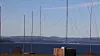Jeløy Radio ble lagt ned som sendestasjon i 1995. Fortsatt står de fleste av mastene og kablene igjen, som et minnesmerke over den tidligere aktiviteten på stedet. I bakgrunnen, på den andre siden av Oslofjorden, kan man skimte Holmestrand.