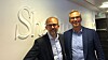 Adm. dir. Sigbjørn Høgne i Sherpa Consulting (til venstre) og adm. dir. i Atea Norge, Michael Jacobs.