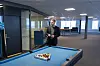 Ole Petter Saxerud er administrerende direktør i Atea Norge. Her foran et billiardbord på kontorene i Økern Portal i Oslo.