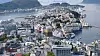 Ålesund sett fra Aksla i 2018. Ålesund kommune er største eier i Tafjord-konsernet som nå har solgt 49 prosent av bredbåndsvirksomheten til infrastrukturfondet Infranode.
