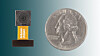 En variant av kameraet som har blitt test i forskningsprosjektet, sammenlignet med en quarter dollar-mynt.