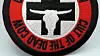 Tøymerke med logoen til hackergruppen Cult of the Dead Cow.
