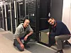 16,8 petaflops: Når alle åtte DGX-2 er på plass ved juletider, så vil forskerne ved CAIR i Grimstad få en enorm regnekraft. Her ser vi (fra v.) IT-ansvarlig Sigurd Brinck fra CAIR og forsker Bernt Viggo Matheussen fra CAIR og Agder Energi. Foto: UiA