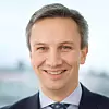 Esben Tuman er kommunikasjonsdirektør i Norwegian. Han sier flyselskapet endret rutiner i 2022, før Datatilsynet vedtok irettesettelsen av dem. Foto: Norwegian