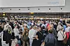 Kø på flyplassern i Brussel.